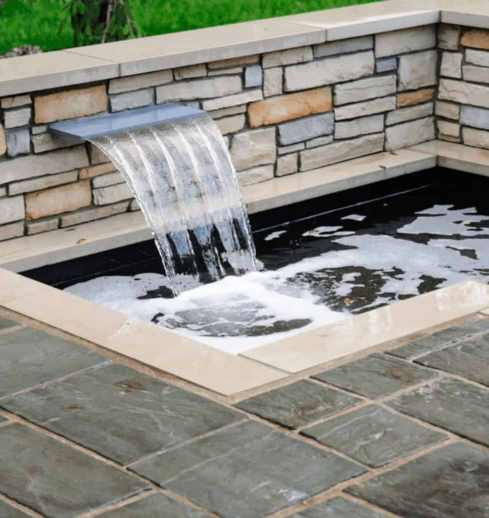 Small Water Feature off of Retainer Wall