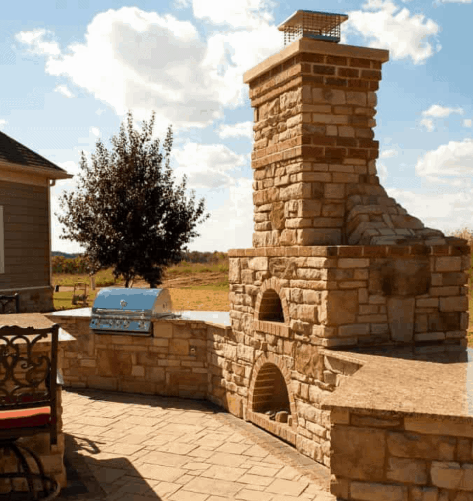 Custom outdoor kitchen matches customers’ existing Tuscan indoor kitchen