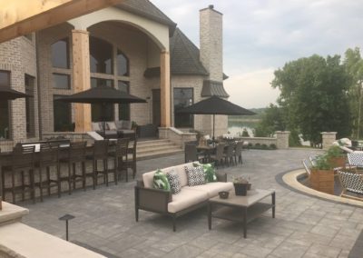 backyard patio with stone matching home