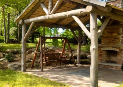 The timber frame was made with hand hewn logs and antique tin roof.