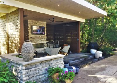Outdoor living room with amenities.