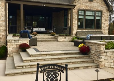 Transition space to the pergola matches the home.