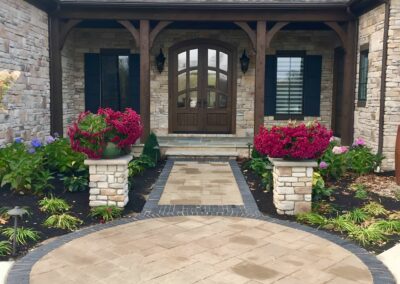 Elegant custom brick and stone designs welcome guests.