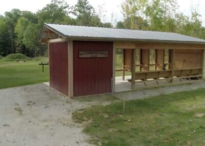 The homeowners wanted a place to enjoy their love of target shooting, so Brothers Grimm created a fully customized shooting range with a covered firing area and seating – safely facing away from other entertainment spaces.